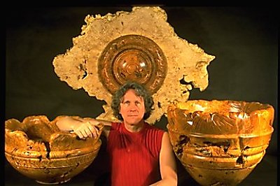 Dennis Elliott with Sculpted Vessels, turned, carved & burned Bigleaf Maple Burl